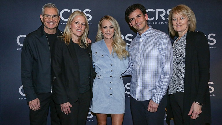 Pictured (L-R) before BMI songwriter Carrie Underwood is interviewed on stage at the Country Radio Seminar in Nashville are: CRS Executive Director RJ Curtis, BMI’s Leslie Roberts, multi-award winning BMI songwriter and artist Carrie Underwood, BMI’s David Levin and Summit Media Senior Vice President of Programming Beverlee Brannigan.