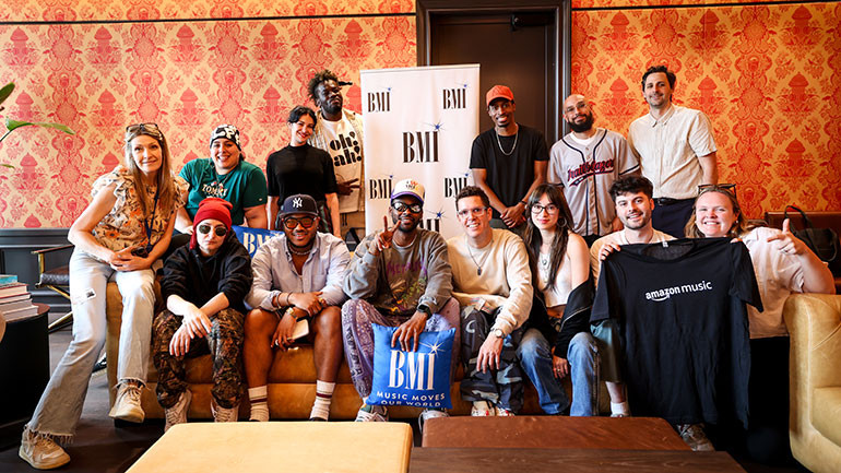 (Front) BMI’s VP, Creative Samantha Cox, Bae from BaeRose, Josiah Bassey, JayPrezi, Mr. Sonic, Kyle Reith, Zoe Koe, BMI’s Director, Creative Katie Kilgallen, (back) Rose from BaeRose, Amazon Music’s Songwriter and Publisher Relations Manager Michelle Fantus, Amazon Music’s Eno Ajueyitsi, ClickNPress and Amazon Music’s Head of Songwriter, Publisher and Society Relations Tom Winkler at BMI and Amazon Music’s Studio Sessions at Anti Social Camp in Brooklyn, NY on June 12, 2024.