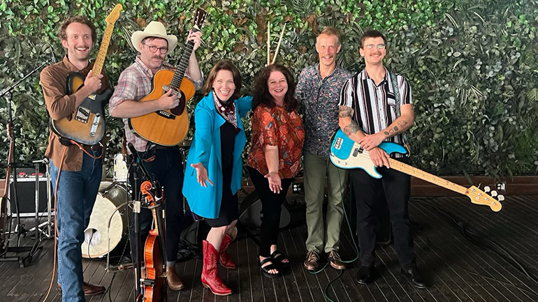 Pictured before Jomo & The Possum Posse kicked off the show: Lead guitarist Jes Clifford, vocalist/guitarist and fiddle player Jomo Edwards, National Restaurant Association President & CEO Michelle Korsmo, BMI’s Jessica Frost and bassist Taylor Turner.