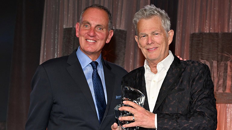 BMI’s President & CEO Mike O’Neill honors David Foster onstage at the 74th Annual BMI/NAB Dinner at Encore Las Vegas on April 16, 2024.